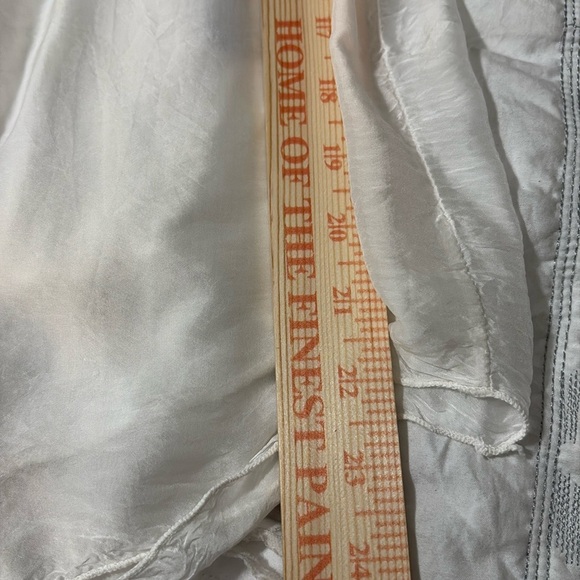 White silk made in Italy blouse. 3D flowers at v neckline. Ruffle front. - Picture 14 of 15